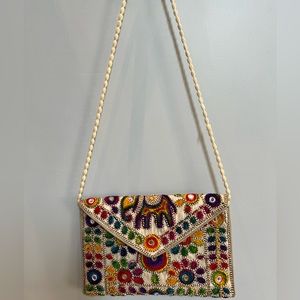 Artisan made embroidered clutch bag !